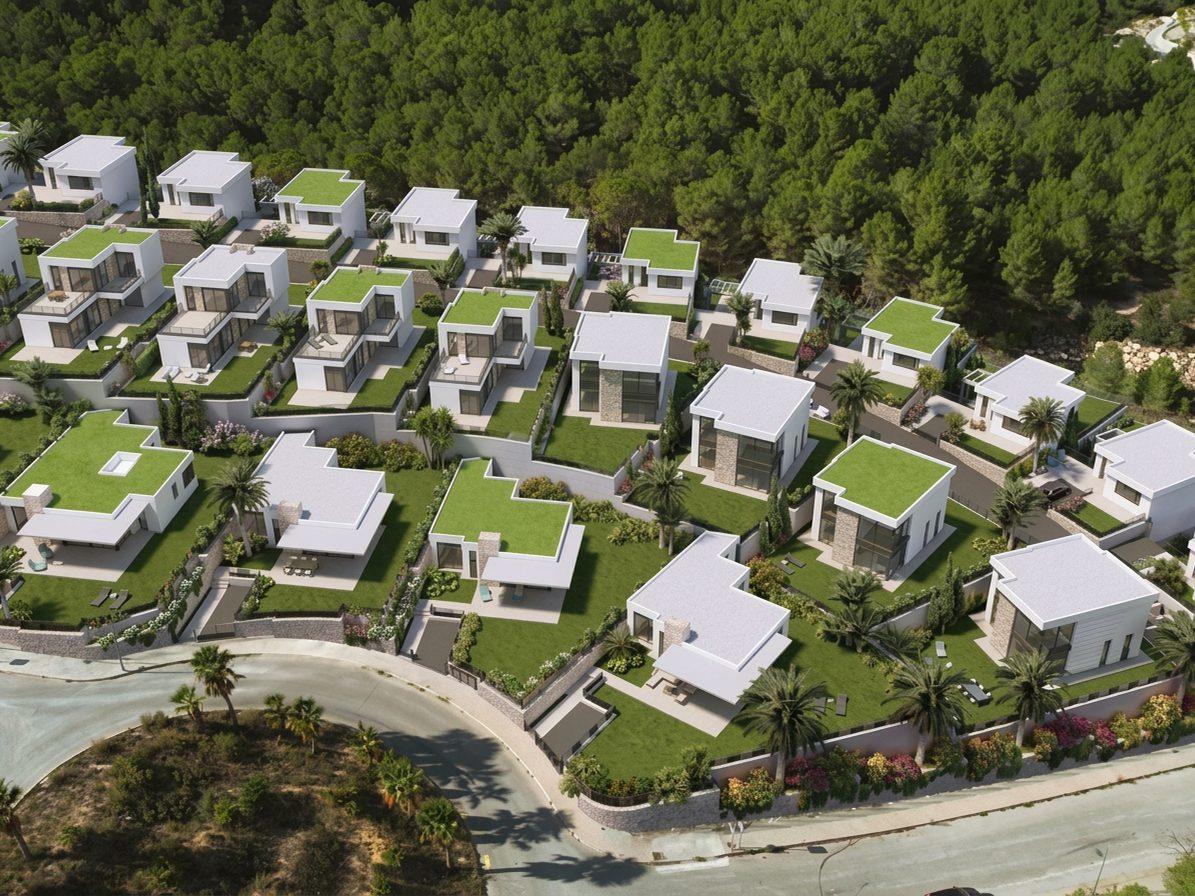 Aerial view of new-build villas with gardens in Polop